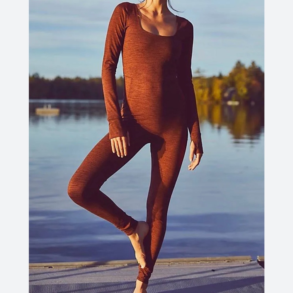Free People movement NWOT cross back long sleeve jumpsuit size XS